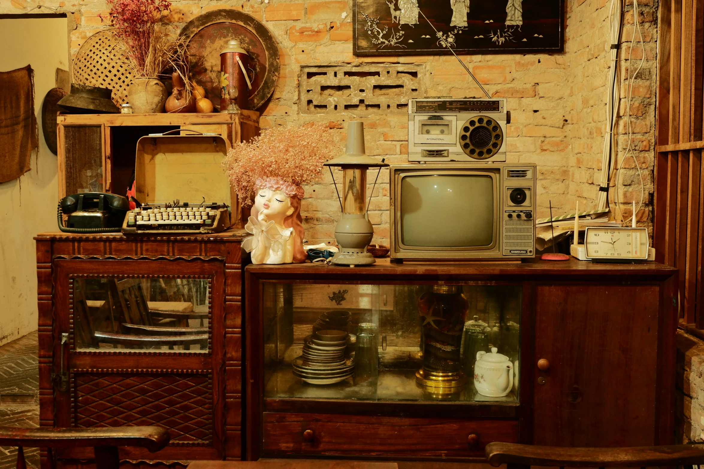 old fashion kitchen with old items displayed in glass case