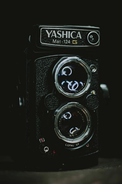 an old camera with the text yashica on it