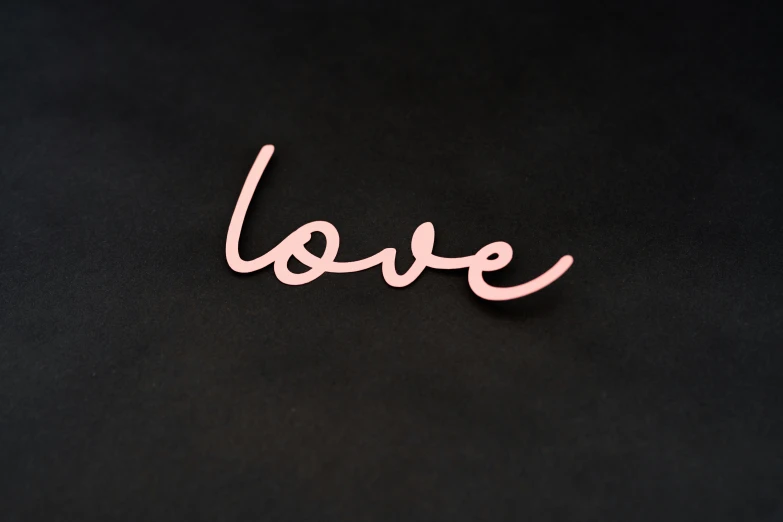 a black background with the word love spelled in white lettering