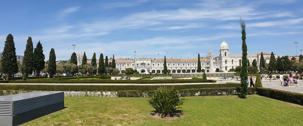 this is a view of a huge building behind a park