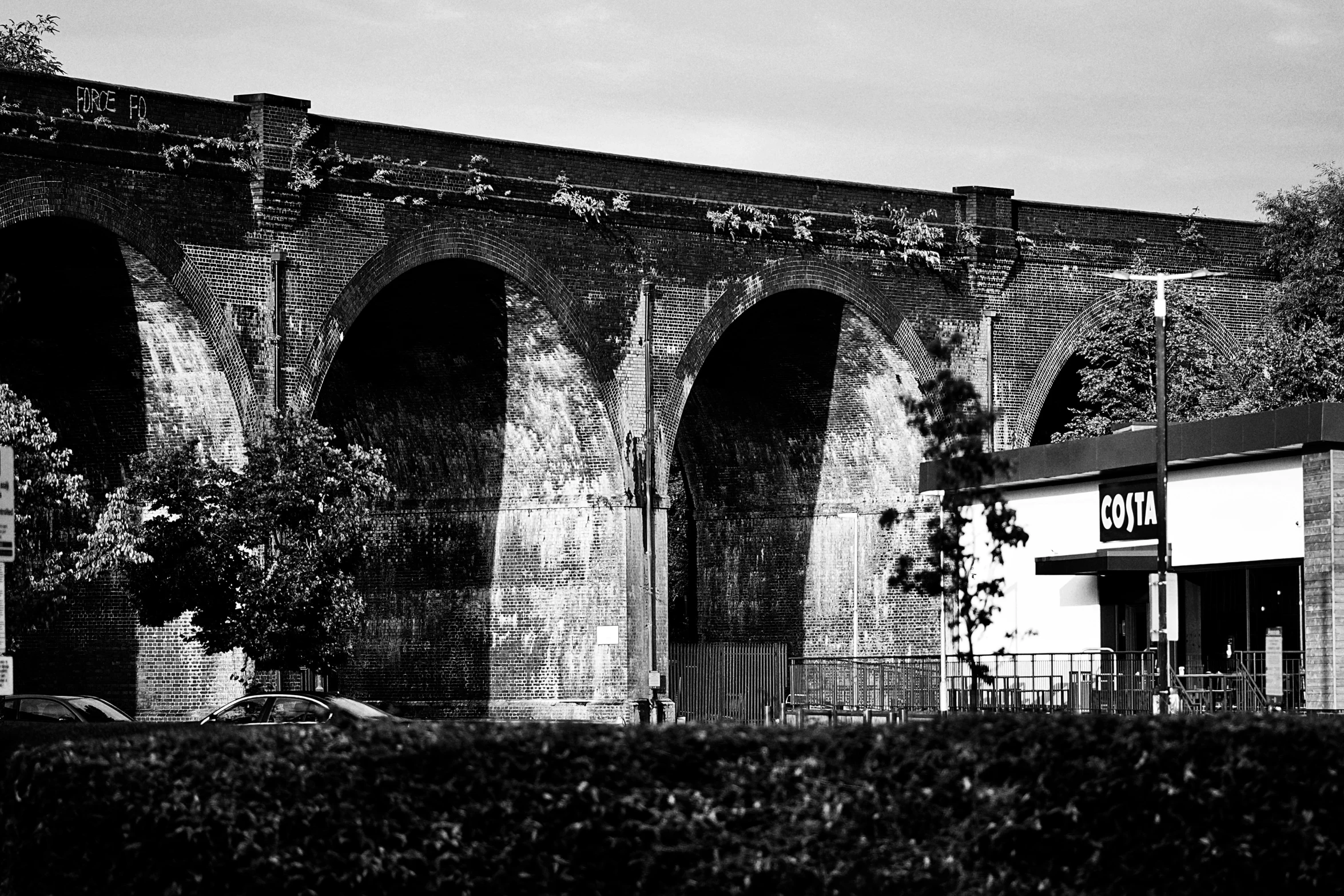 black and white pograph of an old stone structure