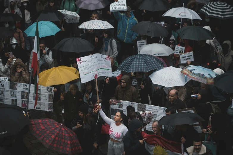 an image of people protesting with umbrellas