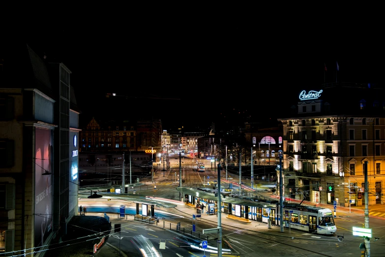a city street is illuminated up at night
