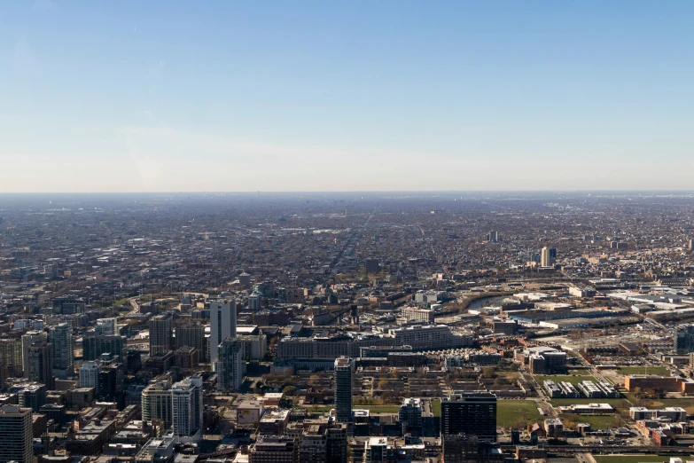 an aerial view of a city, some of which are part skyscrs