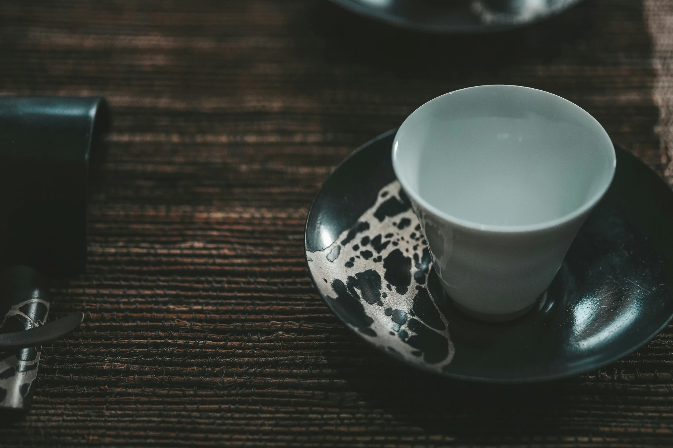 the coffee cup is on top of a saucer