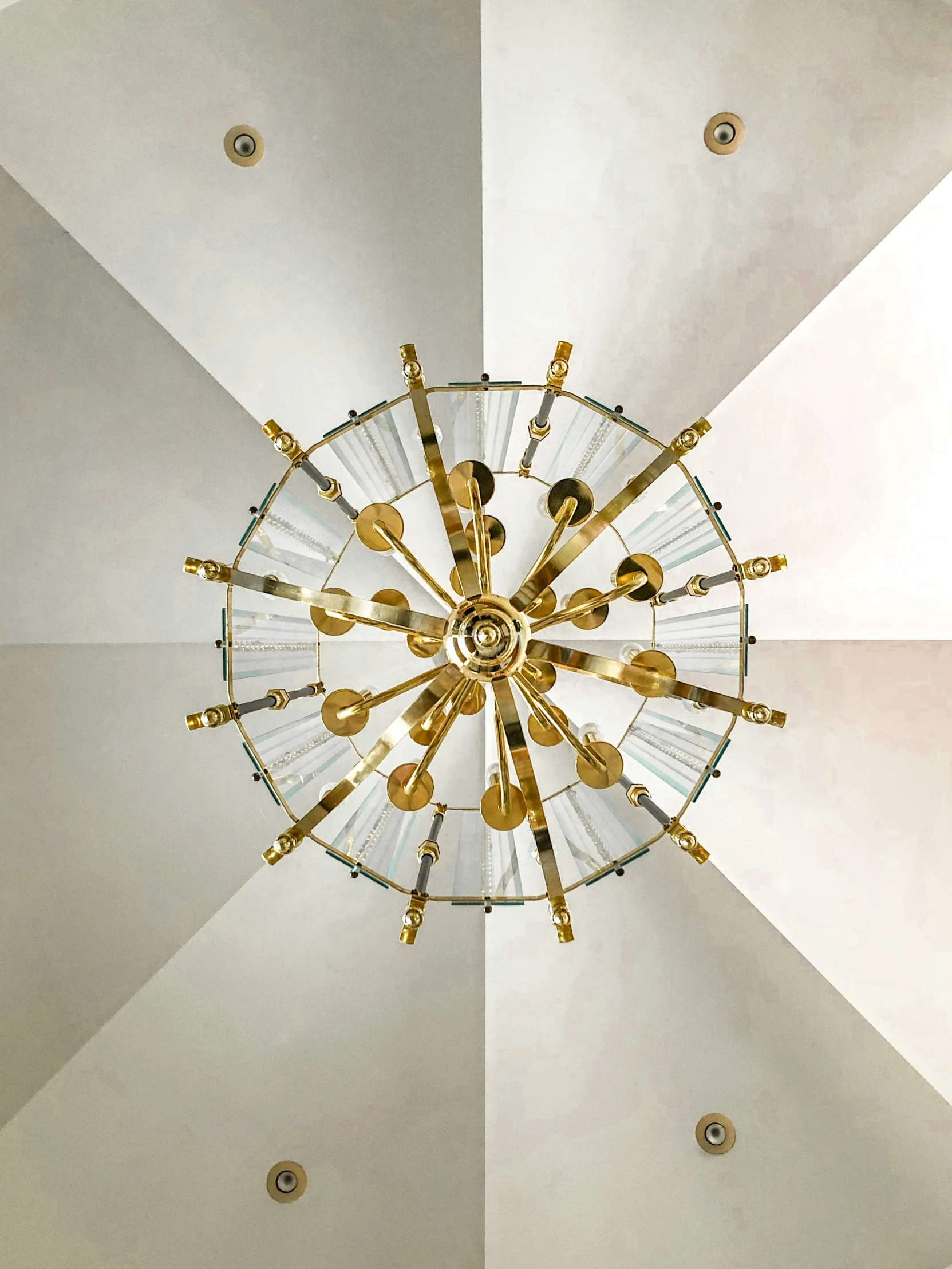 gold decorative lights hanging from a ceiling fixture