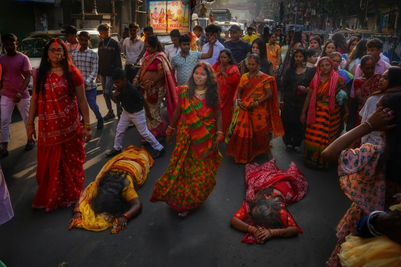 a crowd of people are gathered in a busy area