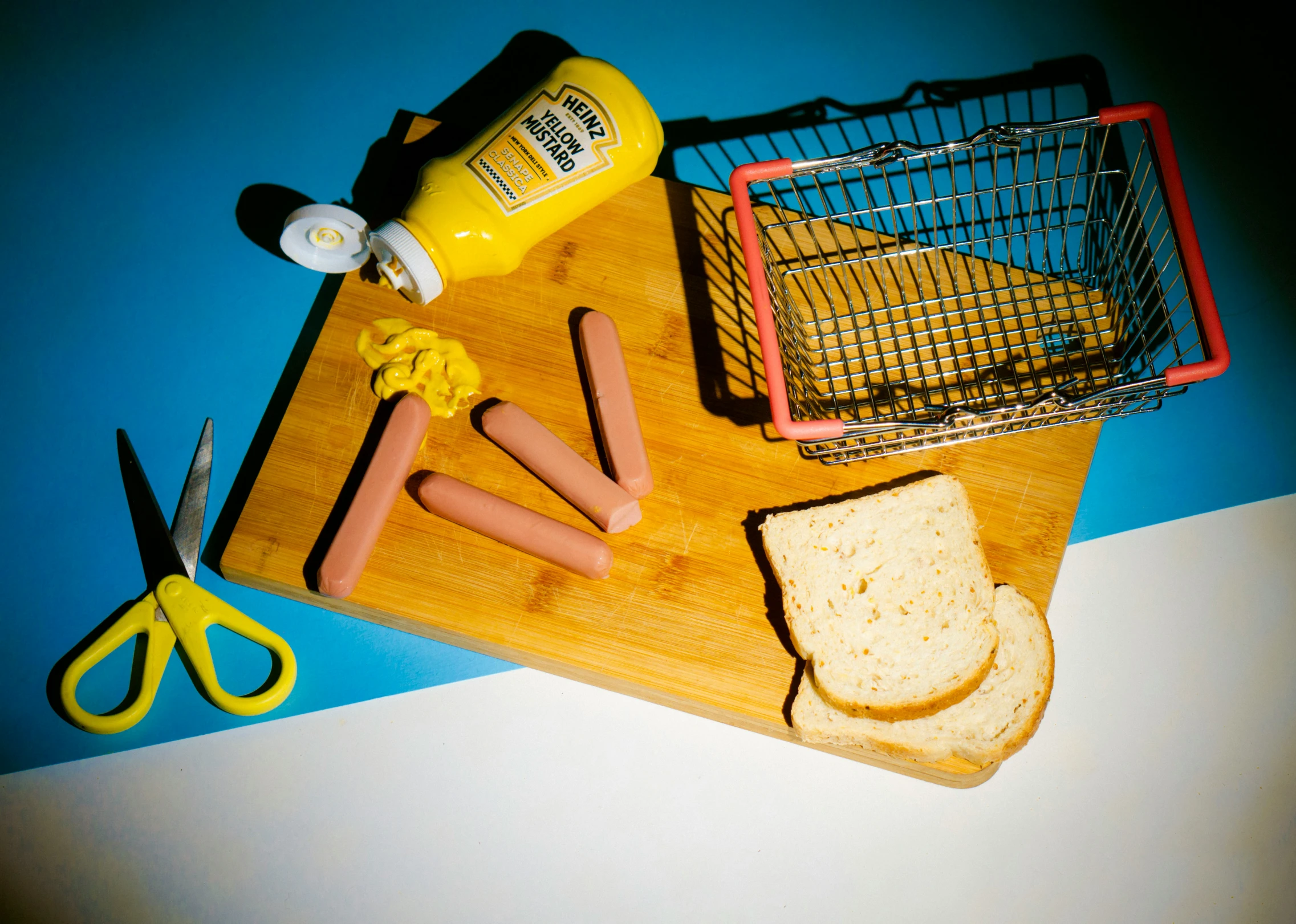 a  board with bread and glue with other items