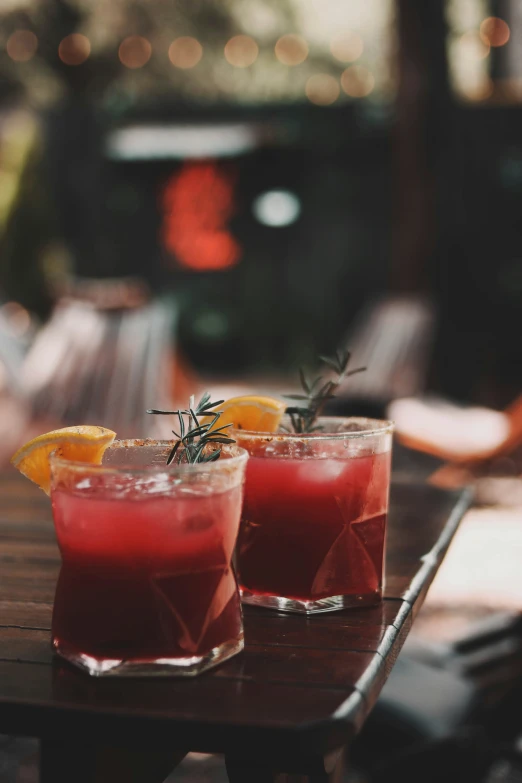 the two alcoholic drinks are served together on the table