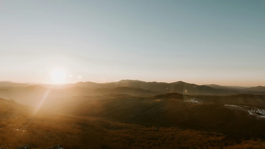 a couple of mountains that are in the sky