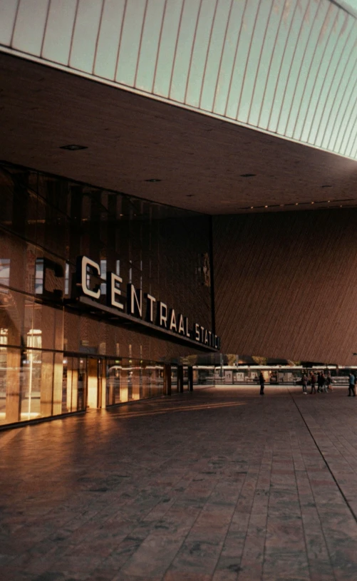 the outside view of a building shows the central street sign