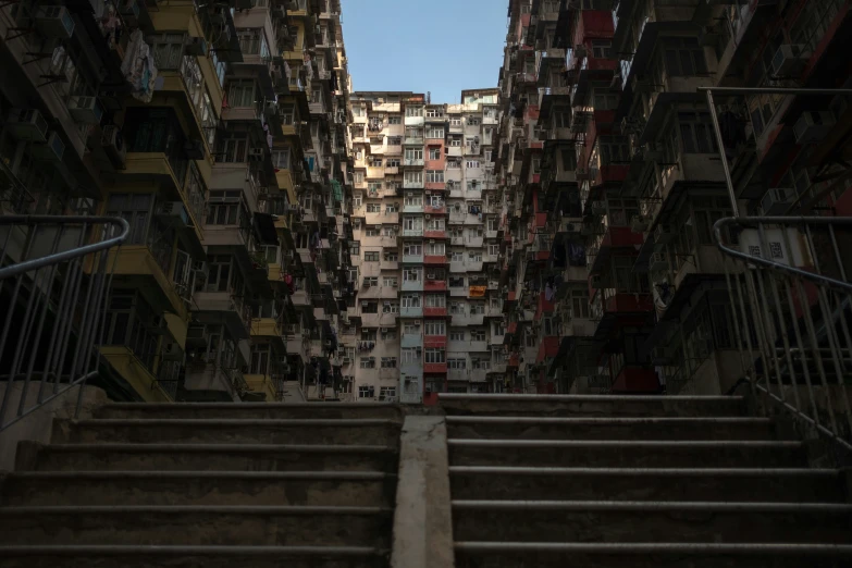 a staircase with multiple building's in the background