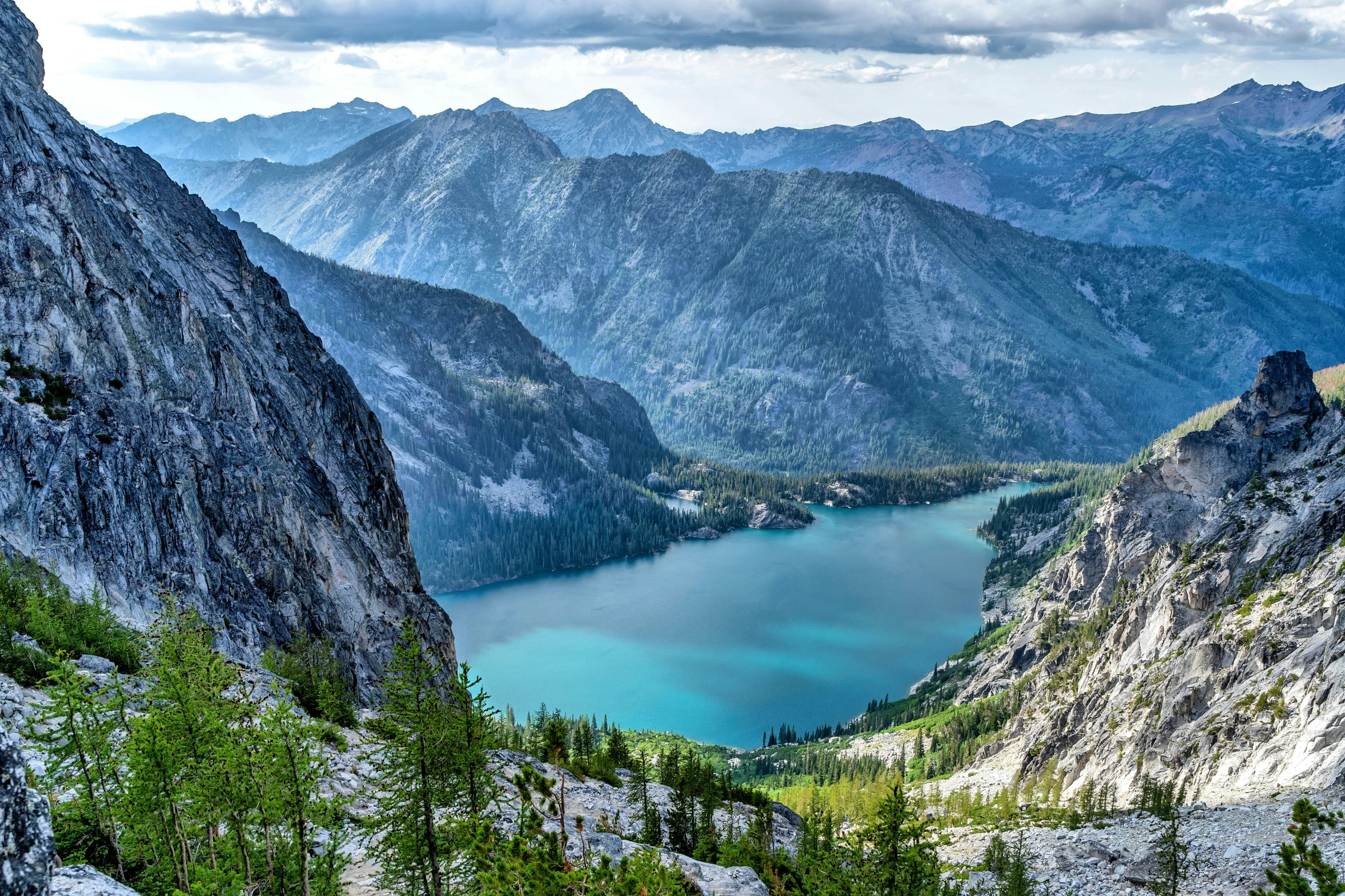 a landscape of mountains, lakes and mountains