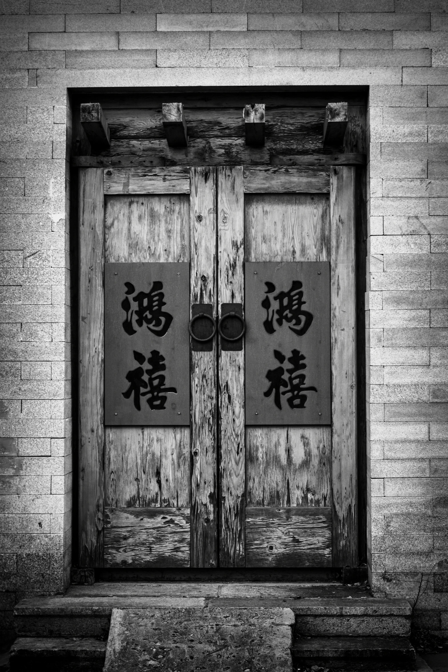 the door is open to an old, rundown building