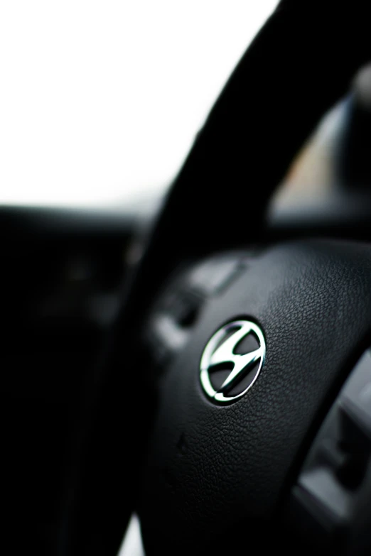 close up of the steering wheel on an mercedes benz car