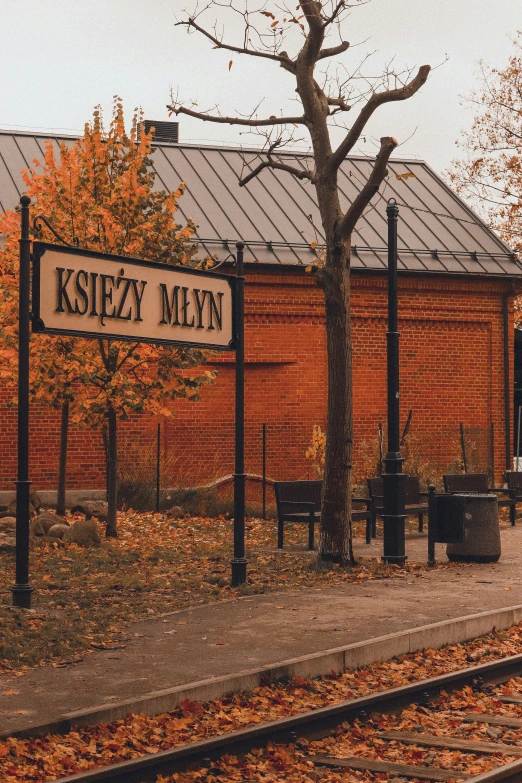 a brick train station that has several buildings