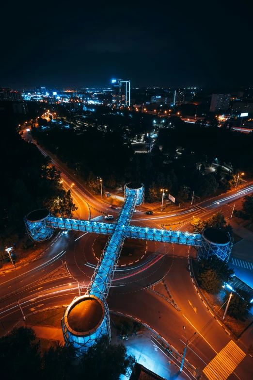 an intersection with light traffic in the night