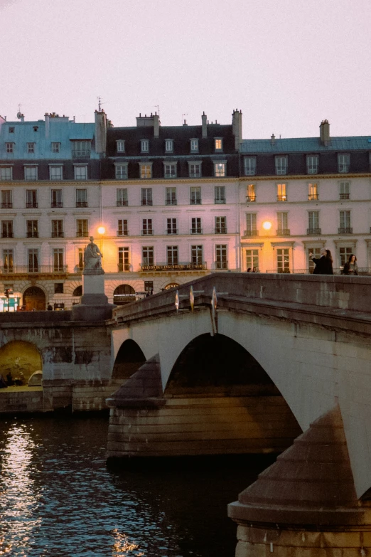 the old bridge across the canal is in paris
