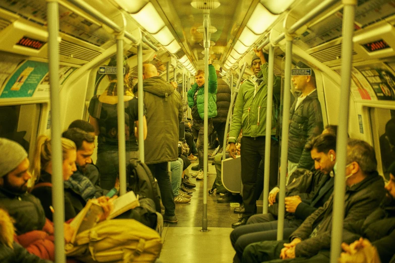 a bunch of people riding in the seat car