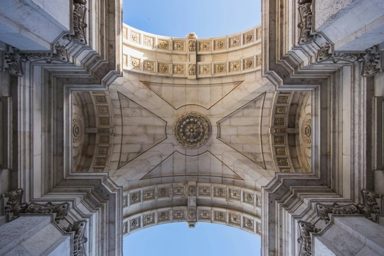 an arched building with decorative architecture