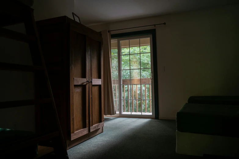 an empty room with a ladder in it