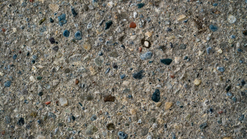 several rocks arranged together near some water