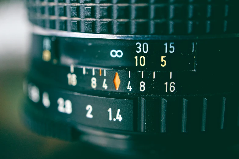 a close up of a camera lens on a table