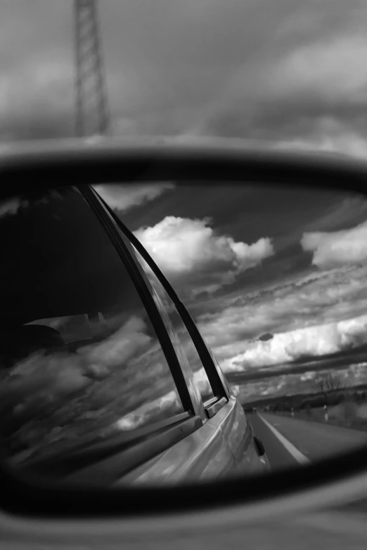 the wing of an airplane is shown in the mirror