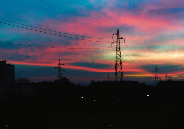 a cloudy sky in a purple and pink sky