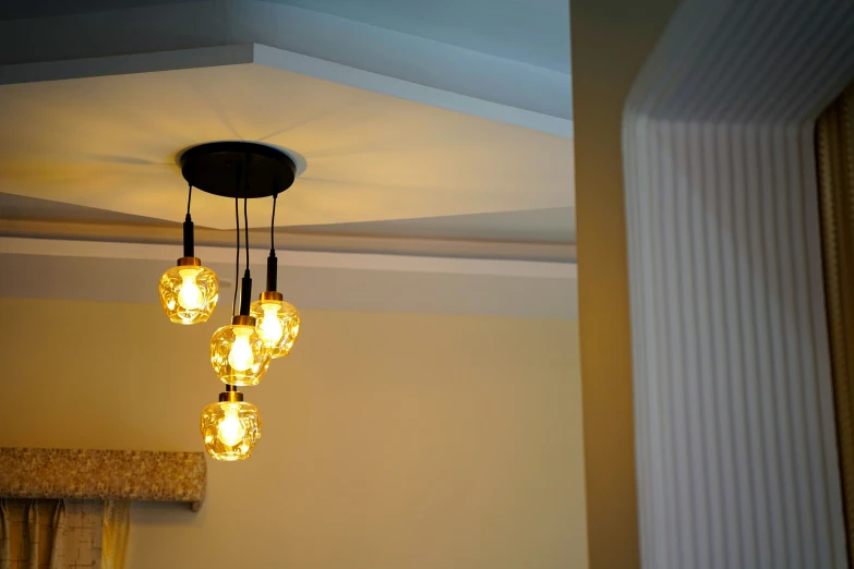 a room with yellow walls and ceiling lights