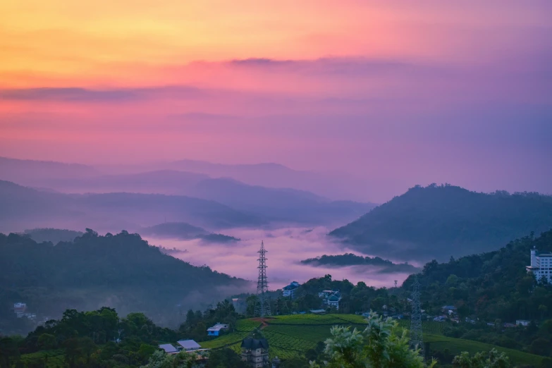 view of a foggy sky from the top of a mountain