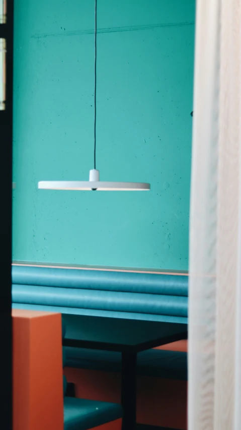 an image of a blue room with chairs