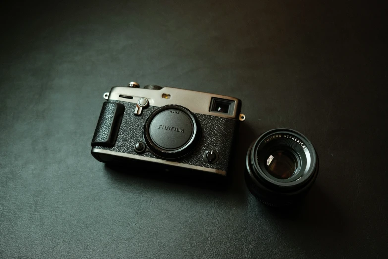 an antique camera sits on top of a table