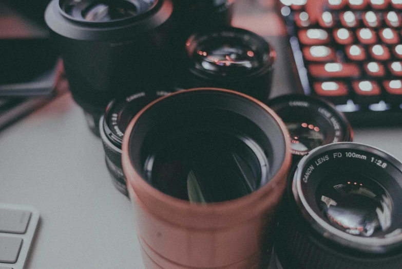 a bunch of different cameras are lined up together