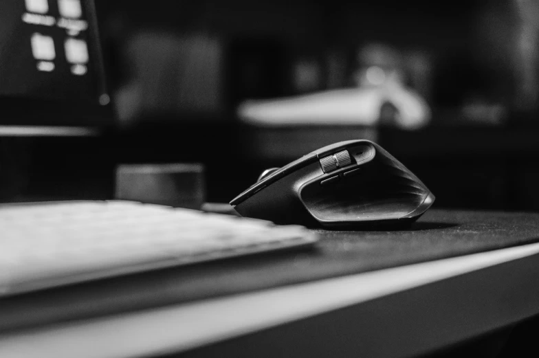 a pair of shoes are lying on a computer keyboard