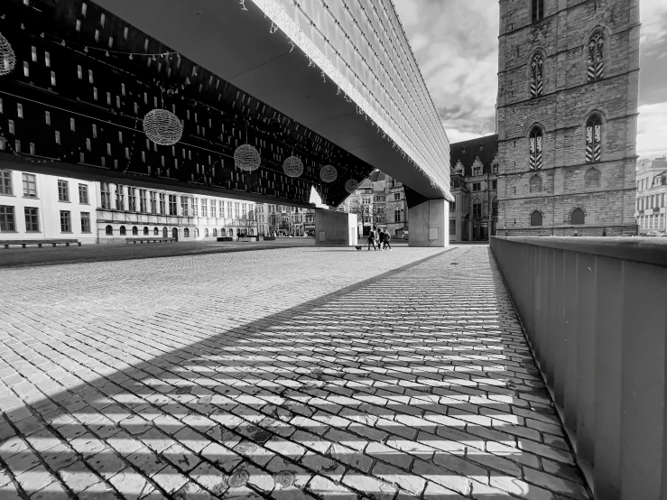 the view from under a walkway with brickwork