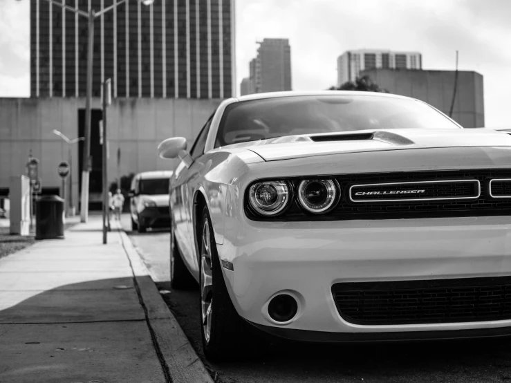 black and white pograph of front end view of a sports car