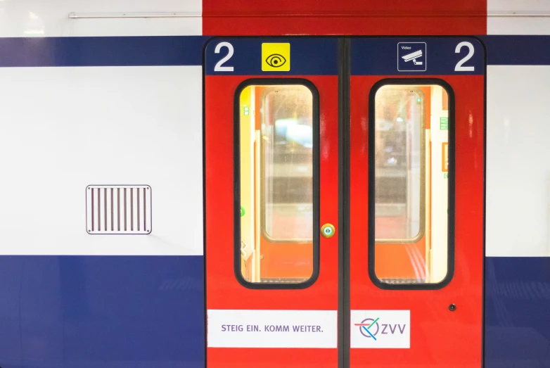 the doors of a train at the station