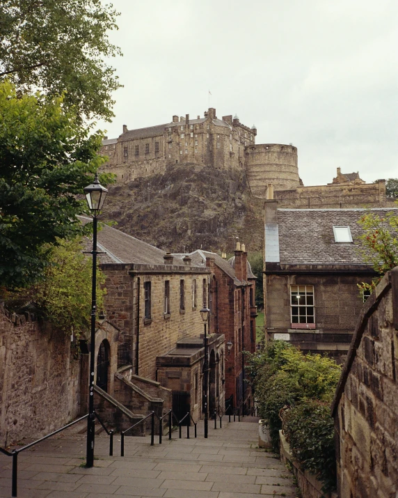 a city street lined with old stone buildings