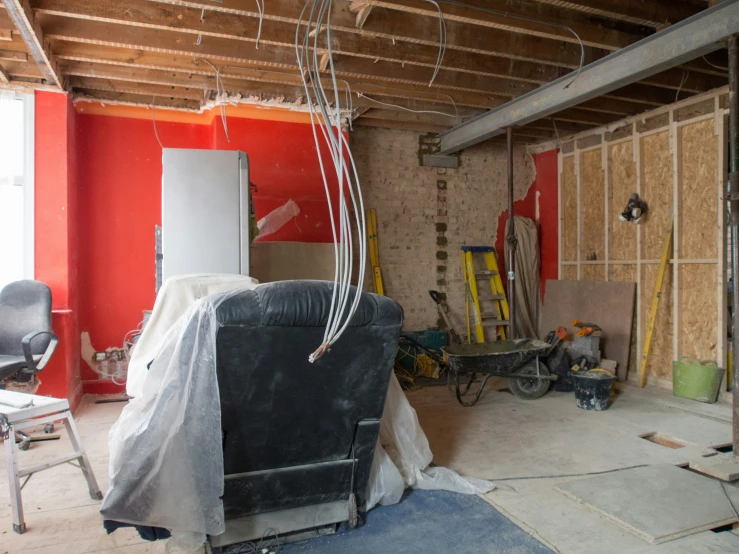 a room filled with construction materials in the midst of being renovated