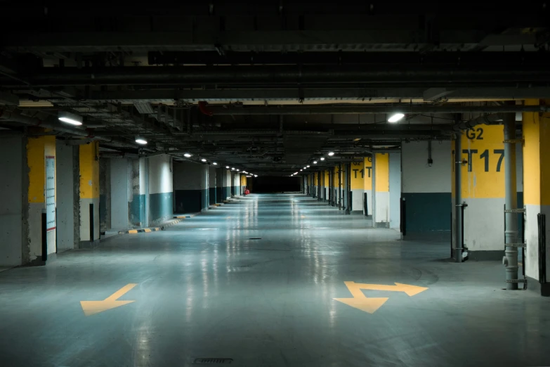 the large parking garage is clean and empty