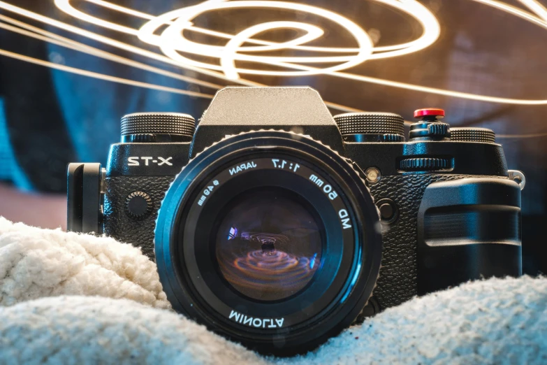 a camera sits in front of some cables