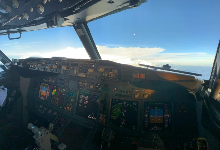 the inside view of a small airplane with the windows in front