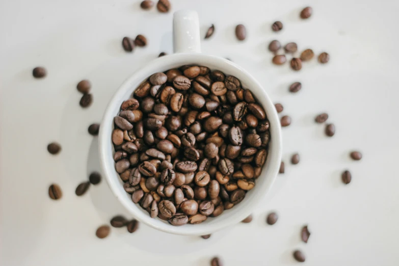 coffee beans in a cup on a table