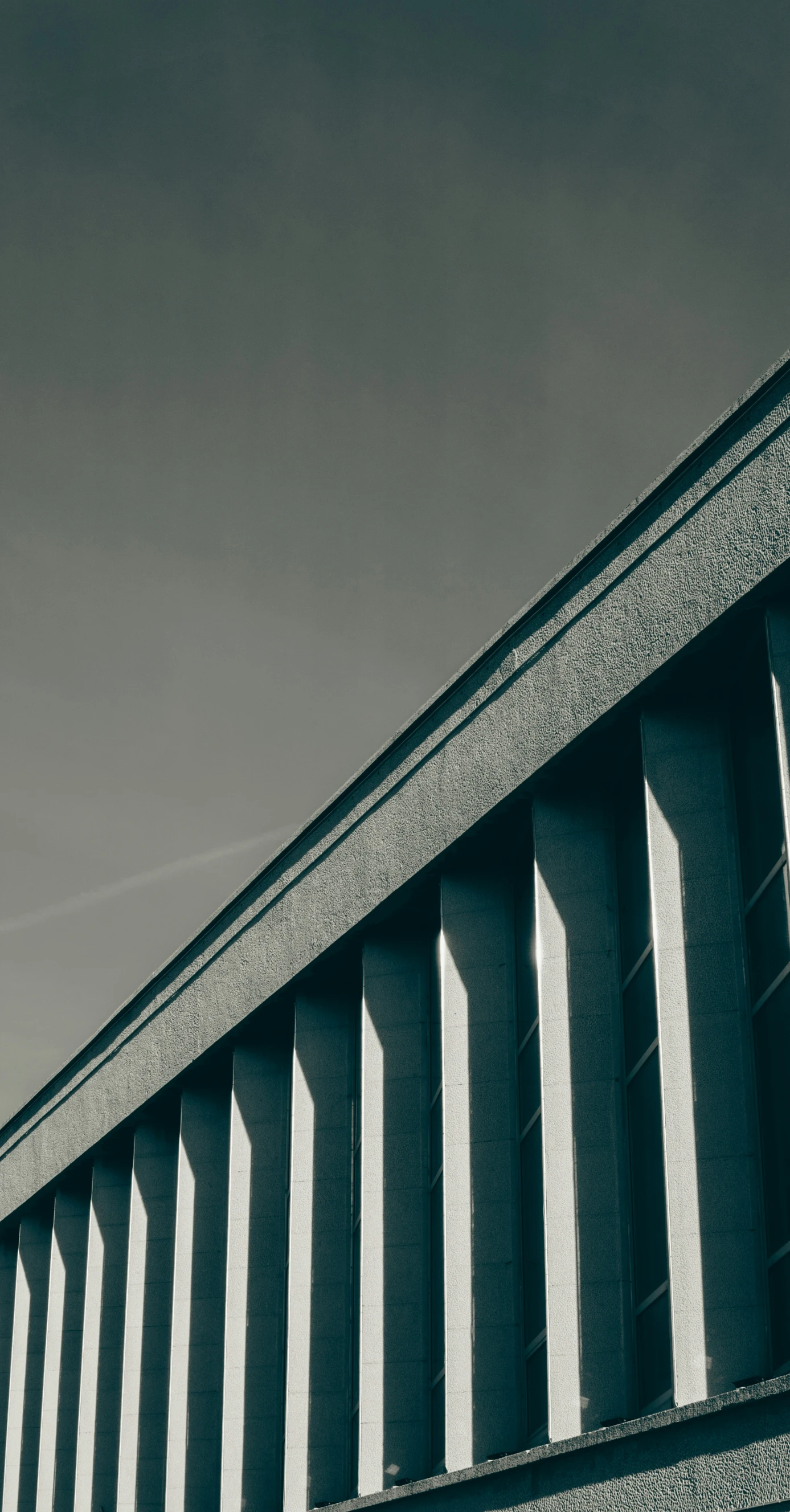 a view of an open air area from underneath the roof