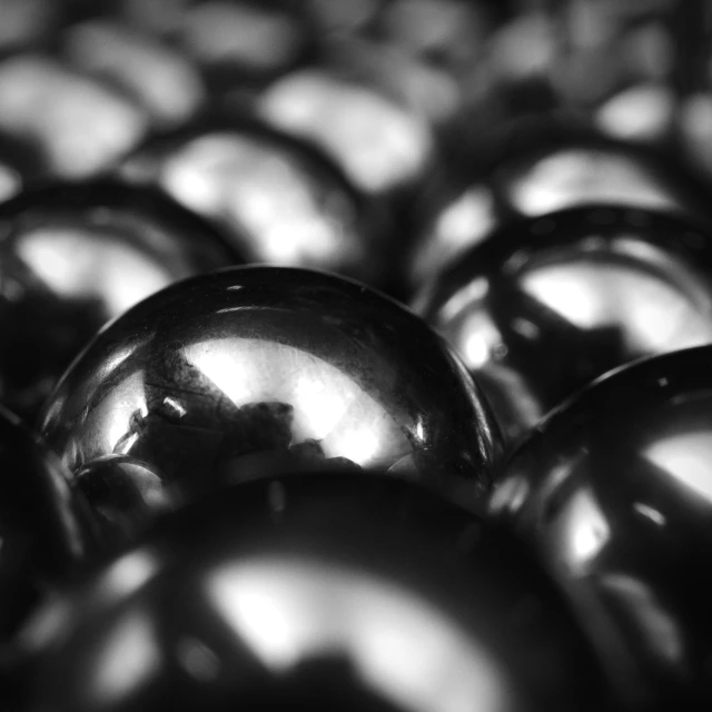 shiny round glass balls piled on top of each other