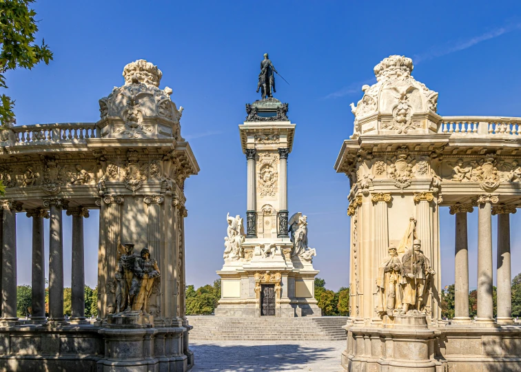 a picture taken of an old statue and pillars