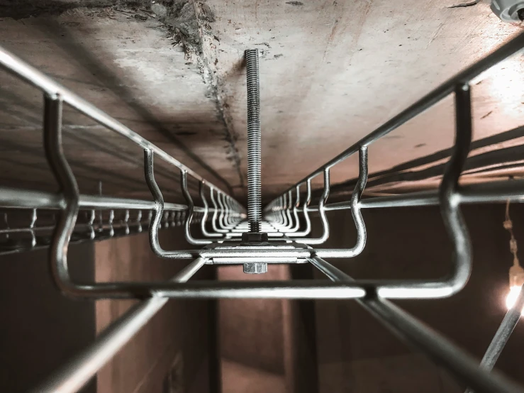 an up close view of a metal wire and a pipe