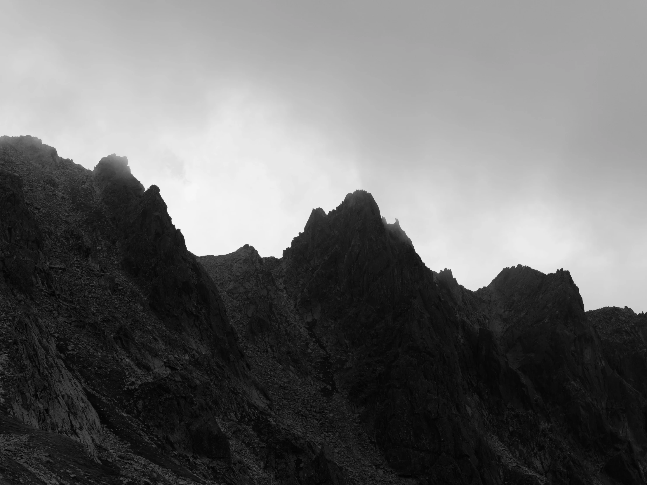 a black and white po of a mountain range