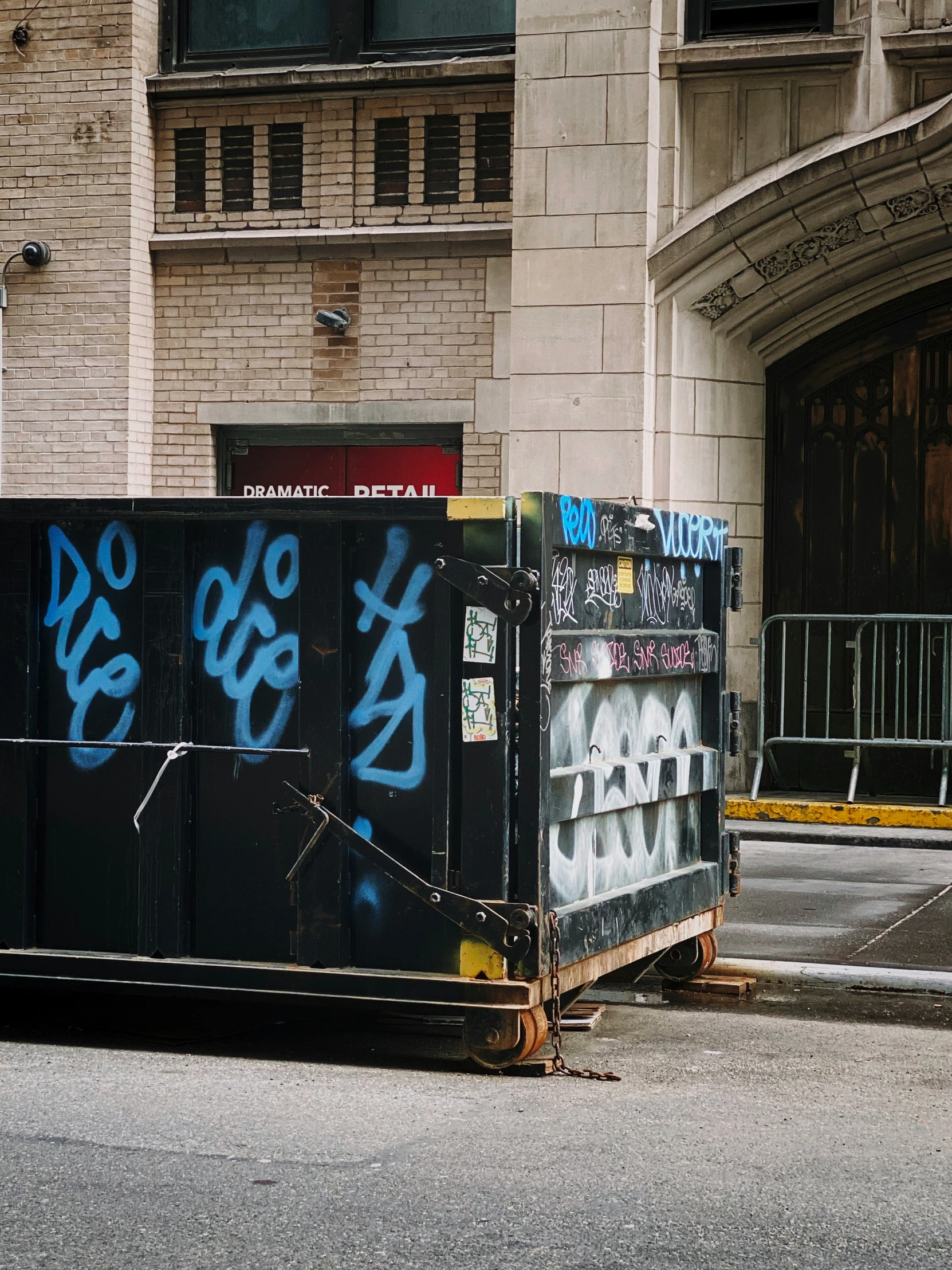 some graffiti spray painted on a side walk